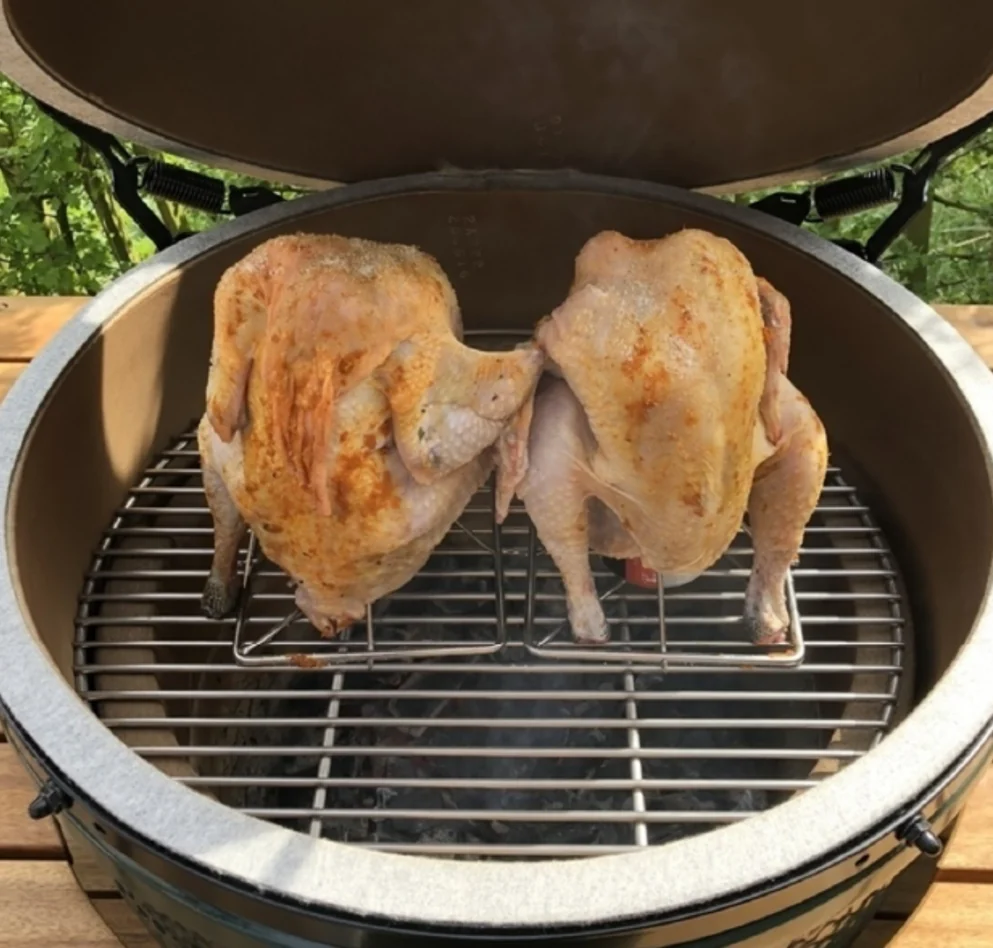 Two free-range chickens on the kamado barbecue